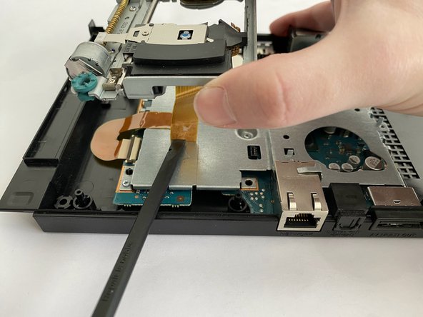 PlayStation 2 Slimline SCPH-900xx Optical Drive Replacement: crwdns2935265:08crwdnd2935265:02crwdnd2935265:02crwdne2935265:0