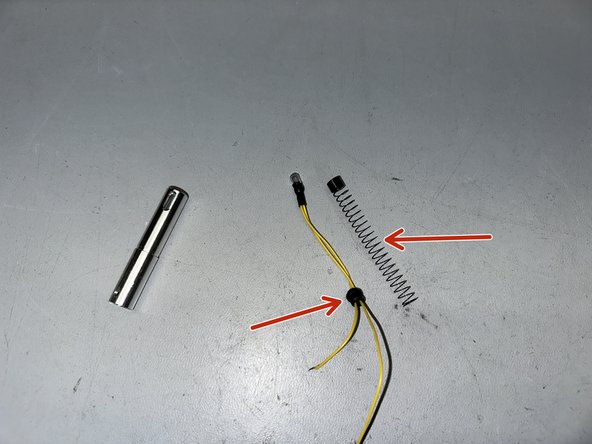 AT-LP120-USB Spotlight Replacement, Removing Spring and Grommet: crwdns2935265:06crwdnd2935265:02crwdnd2935265:02crwdne2935265:0