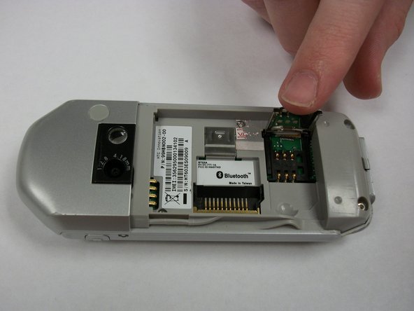 T-Mobile SDA (HTC Tornado) SIM Card Replacement, SIM Card: crwdns2935265:03crwdnd2935265:03crwdnd2935265:03crwdne2935265:0