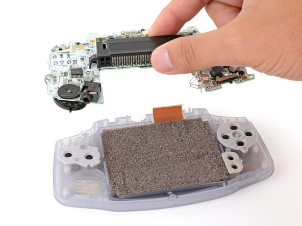 Game Boy Advance Speaker Replacement, Remove the motherboard: crwdns2935265:012crwdnd2935265:02crwdnd2935265:03crwdne2935265:0