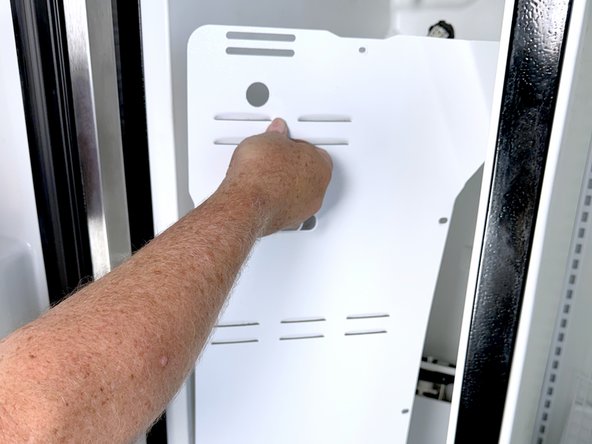 Frigidaire Side-By-Side Refrigerator Evaporator Fan Cover Removal, Remove the upper evaporator cover: crwdns2935265:014crwdnd2935265:03crwdnd2935265:03crwdne2935265:0