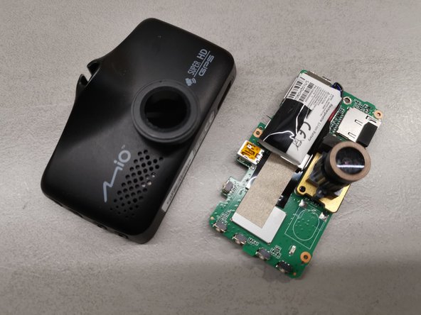 Mio MiVue 698 Disassembly, Remove board from the case: crwdns2935265:04crwdnd2935265:03crwdnd2935265:03crwdne2935265:0