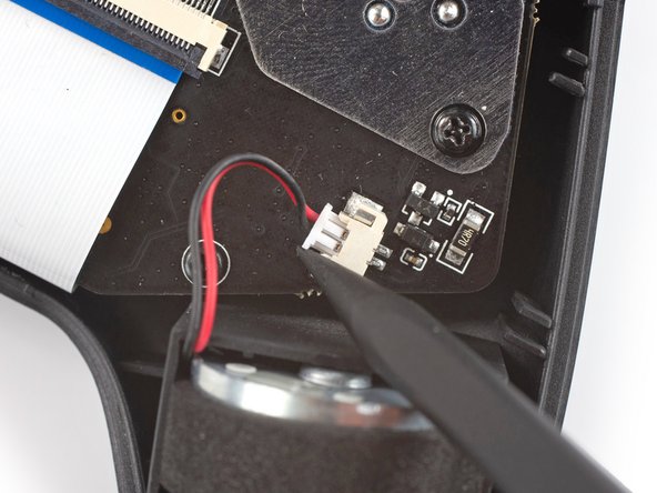 GuliKit KingKong 2 Pro Battery Replacement, Disconnect the left vibration motor: crwdns2935265:07crwdnd2935265:02crwdnd2935265:03crwdne2935265:0