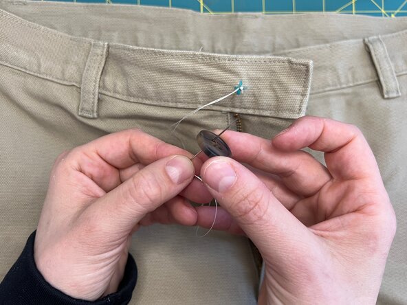 Sew a Button onto Heavy Fabric, Attach the button: crwdns2935265:04crwdnd2935265:03crwdnd2935265:03crwdne2935265:0