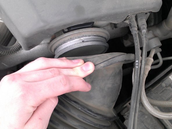 1997-2003 Pontiac Grand Prix GT Air Filter Replacement, Removing the Engine-End of the Intake Tube.: crwdns2935265:04crwdnd2935265:02crwdnd2935265:03crwdne2935265:0