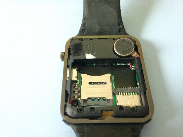 W8 Android Smart Watch Teardown, Vibration Motor Removal: step 5, image 1 of 2