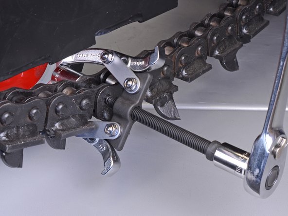 Barreto Trencher E718MTH4S 2016 Chain Roller Spacer Replacement, Remove the master link pin: step 6, image 2 of 3