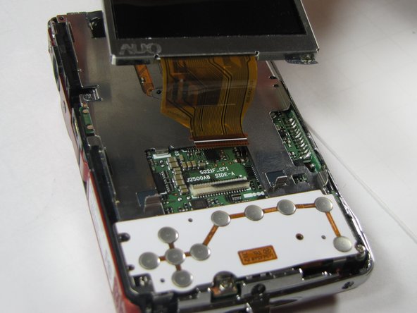 Sanyo VPC-X1200 Button Plate Replacement: crwdns2935265:04crwdnd2935265:02crwdnd2935265:02crwdne2935265:0