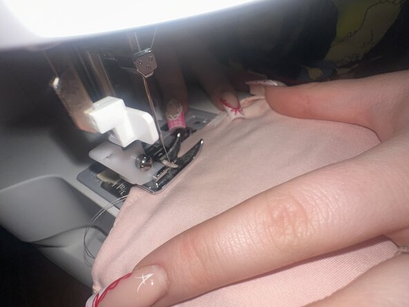 How to Stitch a Ripped Pillowcase Seam: step 5, image 2 of 3