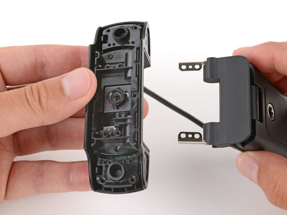 How to Open Your Logitech C920s Webcam, Remove the mounting clip: crwdns2935265:012crwdnd2935265:03crwdnd2935265:03crwdne2935265:0