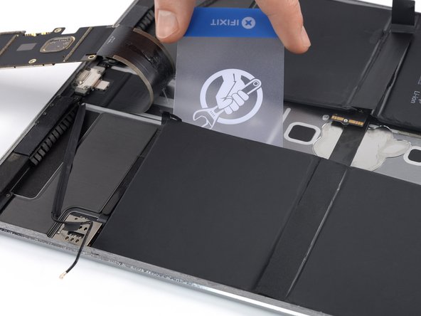 iPad Pro 12.9" 2nd Gen Battery Replacement, Loosen the bottom right battery cell: crwdns2935265:076crwdnd2935265:02crwdnd2935265:03crwdne2935265:0