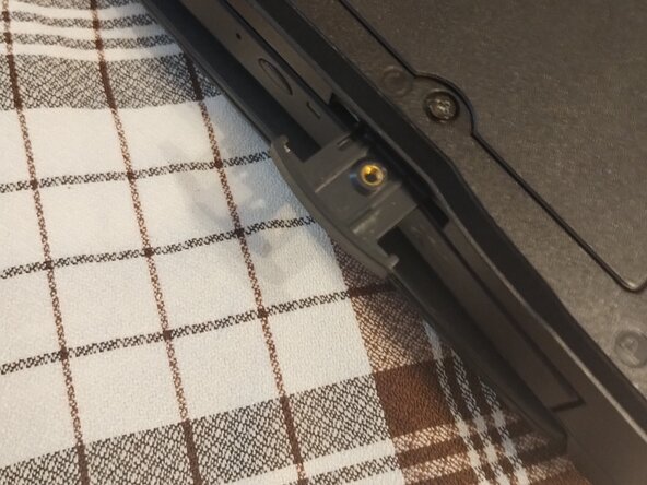 Dell Inspiron 8200 CD-RW/DVD Drive Replacement, Installing the new drive: step 3, image 2 of 2