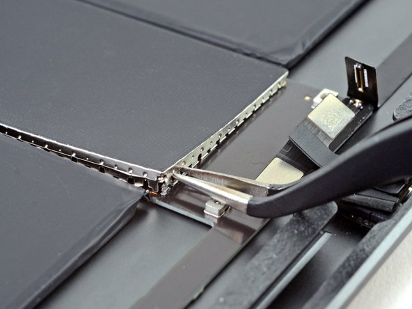 iPad Air 3 Logic Board Replacement, Pry up the logic board shield: crwdns2935265:030crwdnd2935265:03crwdnd2935265:03crwdne2935265:0