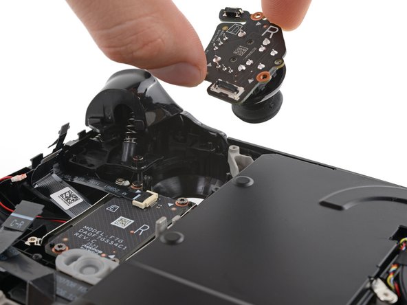 Steam Deck OLED Front Shell Replacement, Remove the right thumbstick: crwdns2935265:055crwdnd2935265:03crwdnd2935265:03crwdne2935265:0