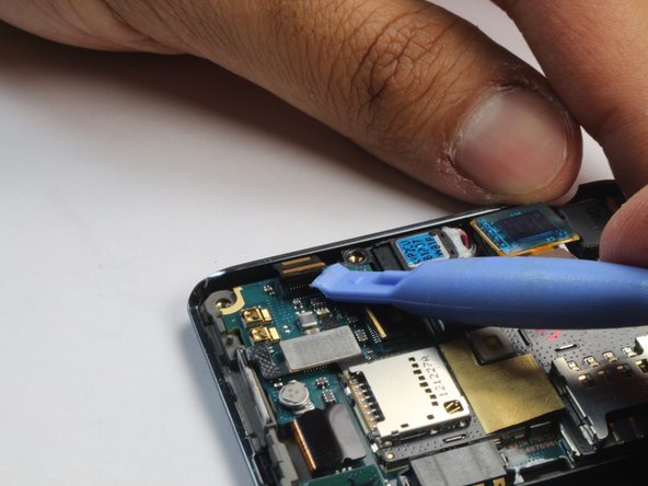 LG Optimus L9 P769 Rear Facing Camera Replacement, Unpluging the Motherboard Cont.: crwdns2935265:03crwdnd2935265:02crwdnd2935265:03crwdne2935265:0