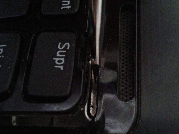 Reemplazo de disco duro de laptop Dell Inspiron N4050, Remover el teclado parte 1: crwdns2935265:04crwdnd2935265:02crwdnd2935265:03crwdne2935265:0