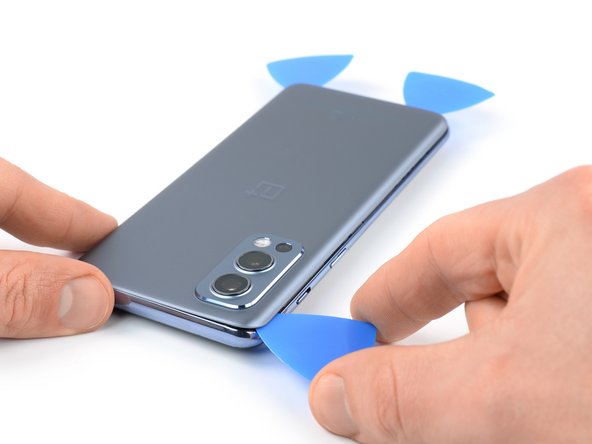 OnePlus Nord 2 5G Battery Replacement, Slice the left edge adhesive: crwdns2935265:06crwdnd2935265:03crwdnd2935265:03crwdne2935265:0