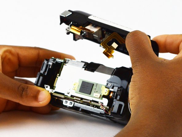 Canon Vixia HF R70 Top Panel Replacement: crwdns2935265:016crwdnd2935265:03crwdnd2935265:03crwdne2935265:0