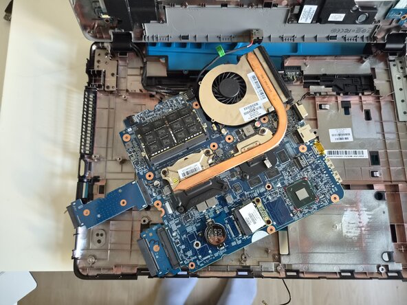 HP ProBook 470 G0 thermal paste Replacement, Success - the board is out!: step 13, image 1 of 2