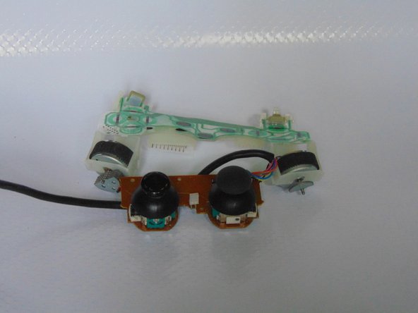 Dualshock 2 Teardown, All the buttons: crwdns2935265:03crwdnd2935265:02crwdnd2935265:03crwdne2935265:0