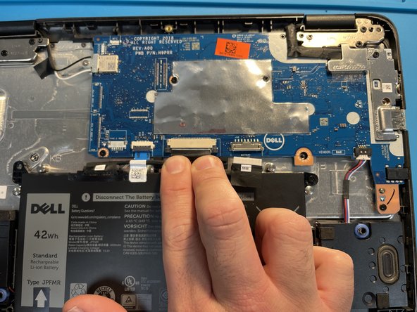 Dell Chromebook 3100 Keyboard Replacement, Disconnect Keyboard Ribbon: crwdns2935265:03crwdnd2935265:02crwdnd2935265:02crwdne2935265:0