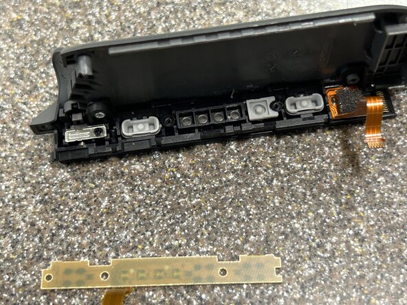 Right Joy-Con Teardown: crwdns2935265:012crwdnd2935265:03crwdnd2935265:03crwdne2935265:0