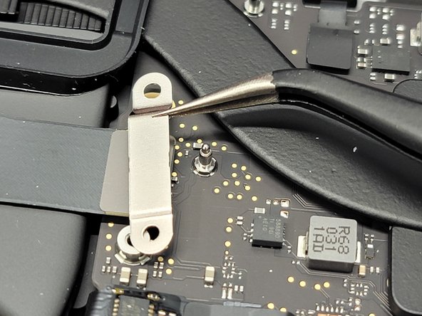 MacBook Pro 13" Two Thunderbolt Ports 2020 Touchbar Removal, Removing Right Speaker Flex Cable Bracket: crwdns2935265:029crwdnd2935265:03crwdnd2935265:03crwdne2935265:0
