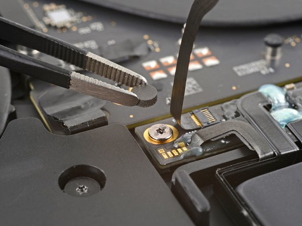 MacBook Pro 13" 2022 (M2) Battery Replacement, Uncover the left battery board screw: crwdns2935265:022crwdnd2935265:02crwdnd2935265:02crwdne2935265:0