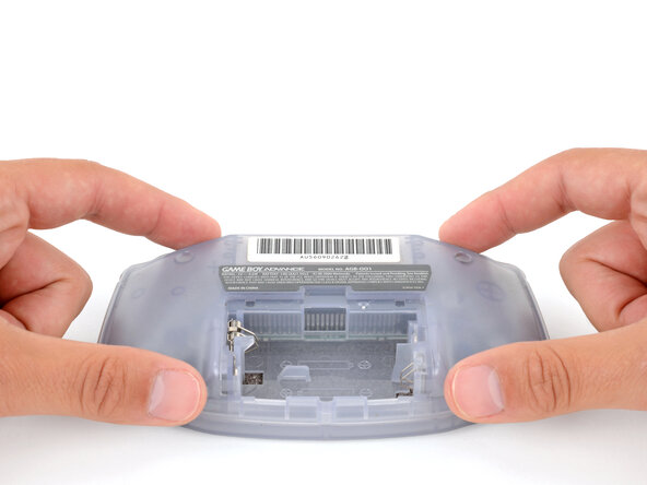 How to Reshell Your Game Boy Advance, Remove the back shell: crwdns2935265:05crwdnd2935265:01crwdnd2935265:02crwdne2935265:0
