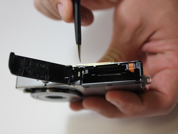 Kodak EasyShare M2008 Battery Door Replacement, Battery Door: crwdns2935265:06crwdnd2935265:02crwdnd2935265:03crwdne2935265:0