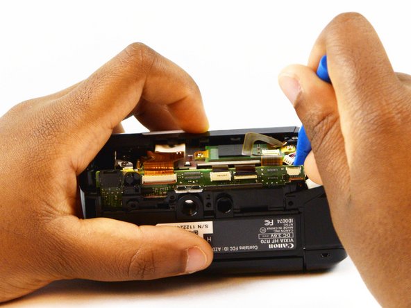 Canon Vixia HF R70 Top Panel Replacement, Top Panel: crwdns2935265:012crwdnd2935265:02crwdnd2935265:02crwdne2935265:0