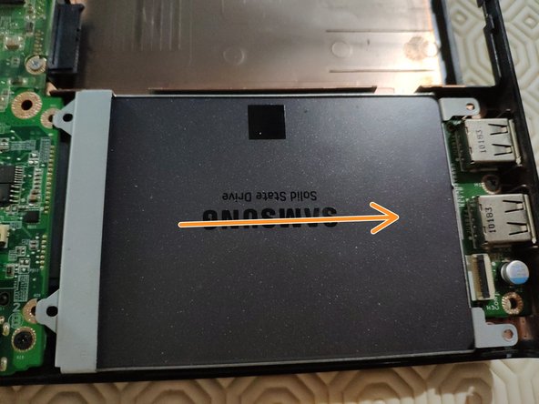 Dell Vostro 1220 Hard Drive Replacement, Detach the hard drive cage: crwdns2935265:010crwdnd2935265:02crwdnd2935265:02crwdne2935265:0