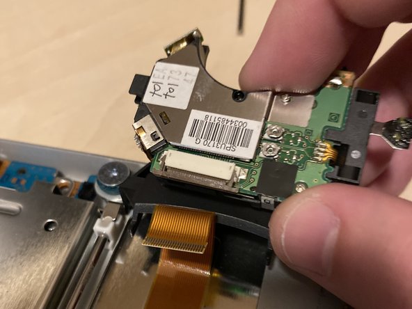 PlayStation 2 Slimline SPU-3170 Laser Replacement, Disconnect the laser: crwdns2935265:07crwdnd2935265:03crwdnd2935265:03crwdne2935265:0
