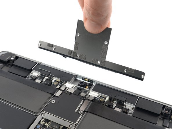 iPad Pro 12.9" 2nd Gen Battery Replacement, Remove the top bracket: crwdns2935265:039crwdnd2935265:02crwdnd2935265:02crwdne2935265:0