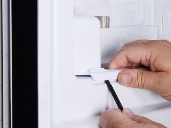 LG Refrigerator Upper Ice Maker Assembly Replacement, Reposition the ice maker assembly: crwdns2935265:04crwdnd2935265:02crwdnd2935265:03crwdne2935265:0