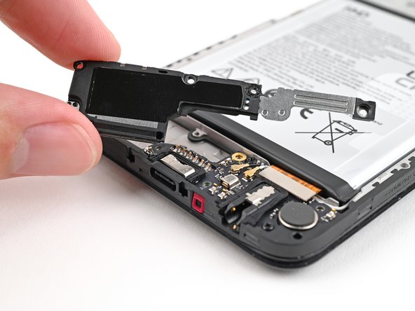 HMD Fusion Business Charging Board Replacement, Remove the loudspeaker: crwdns2935265:012crwdnd2935265:03crwdnd2935265:03crwdne2935265:0