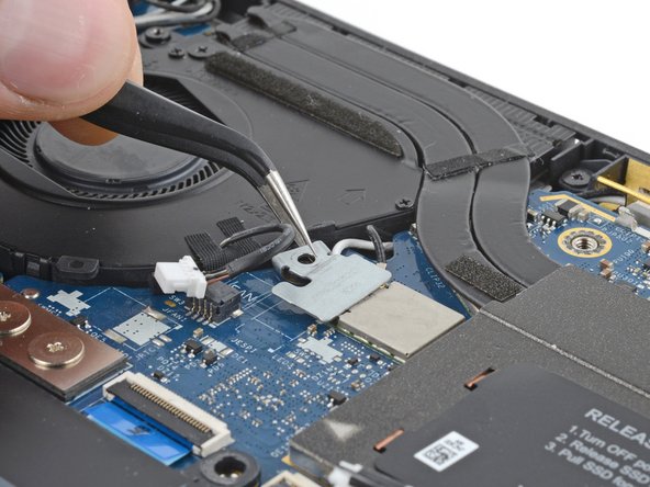 Dell Latitude 7410 Fan Replacement, Remove the WLAN cable bracket: crwdns2935265:011crwdnd2935265:02crwdnd2935265:03crwdne2935265:0