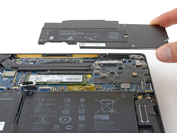 Dell Latitude 7410 Heatsink Replacement, Remove the heatsink shield: crwdns2935265:015crwdnd2935265:02crwdnd2935265:02crwdne2935265:0