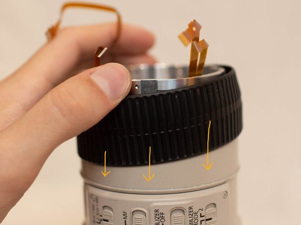 Canon EF 70-200mm f/2.8L IS USM Zooming Key Replacement, Install the Zoom Ring: crwdns2935265:016crwdnd2935265:03crwdnd2935265:03crwdne2935265:0