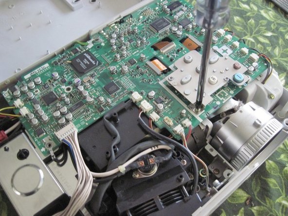 Sharp PG-A10X Thermal Fuse Replacement, Loosen the circuit board (2): crwdns2935265:07crwdnd2935265:02crwdnd2935265:02crwdne2935265:0