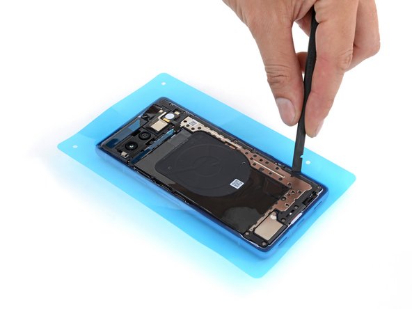 How to Apply Rear Cover Adhesive in Your Google Pixel 7a, Secure the adhesive: crwdns2935265:09crwdnd2935265:02crwdnd2935265:03crwdne2935265:0