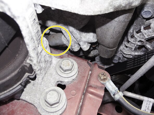 2013-Present Nissan Rogue Cam shaft control solenoid Replacement, Removing the Exhaust valve timing control solenoid valve retaining Bolt: crwdns2935265:02crwdnd2935265:01crwdnd2935265:03crwdne2935265:0