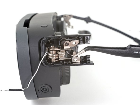 HTC Vive XR Elite Motion Sensor Replacement, Peel the hinge tape: crwdns2935265:025crwdnd2935265:02crwdnd2935265:02crwdne2935265:0