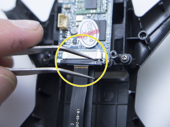 Helicute Petrel H820HC (Drone) Disassembly, Remove the camera cable: step 11, image 2 of 3