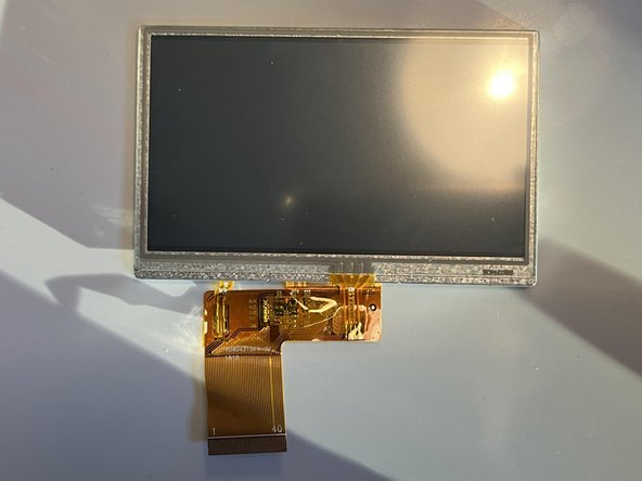 Pocket C.H.I.P. Teardown, Removing the screen: crwdns2935265:07crwdnd2935265:03crwdnd2935265:03crwdne2935265:0