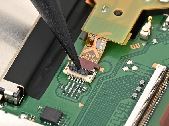 Nintendo Switch 2 Board Replacement, Disconnect the headphone jack: crwdns2935265:046crwdnd2935265:02crwdnd2935265:02crwdne2935265:0