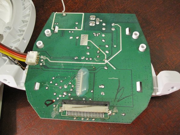Disassembling Philips Wake-Up HF35xx Main PCB, Detach ribbon cable: step 9, image 3 of 3