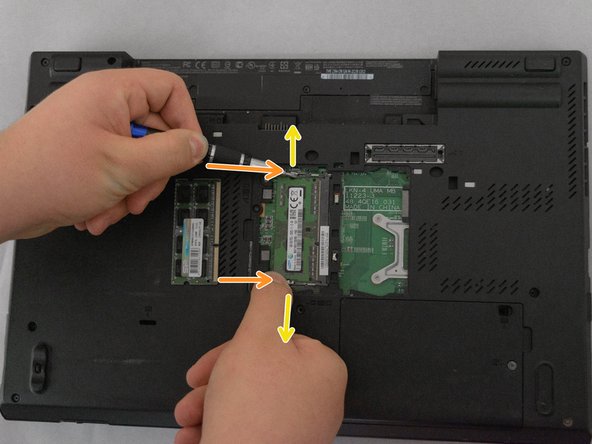 Lenovo ThinkPad T530 Memory Module: Bottom Slot Replacement, Removing Existing Memory Module: crwdns2935265:06crwdnd2935265:02crwdnd2935265:02crwdne2935265:0
