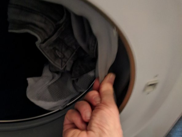 Washing Machine Disassembly to Access Water Drain Pump, Detach door seal from front cover: step 7, image 3 of 3