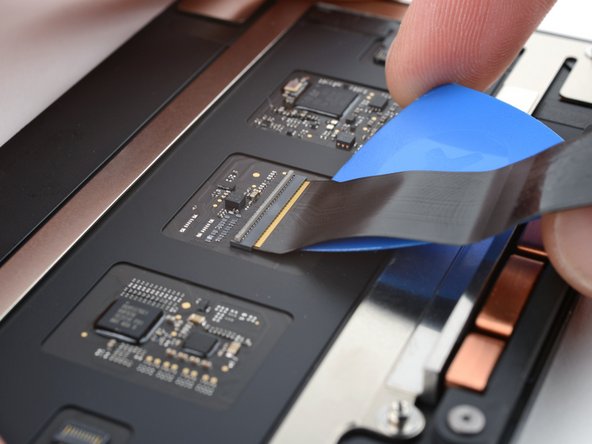 MacBook Pro 14" Late 2023 (M3) Trackpad Replacement, Separate the trackpad cable adhesive: crwdns2935265:027crwdnd2935265:02crwdnd2935265:03crwdne2935265:0